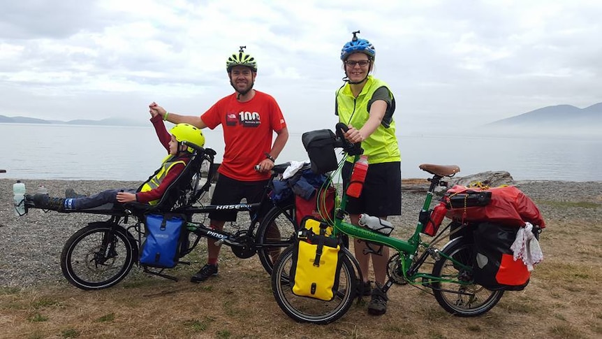 Patch, Travis and Fiona on their customised bicycles.