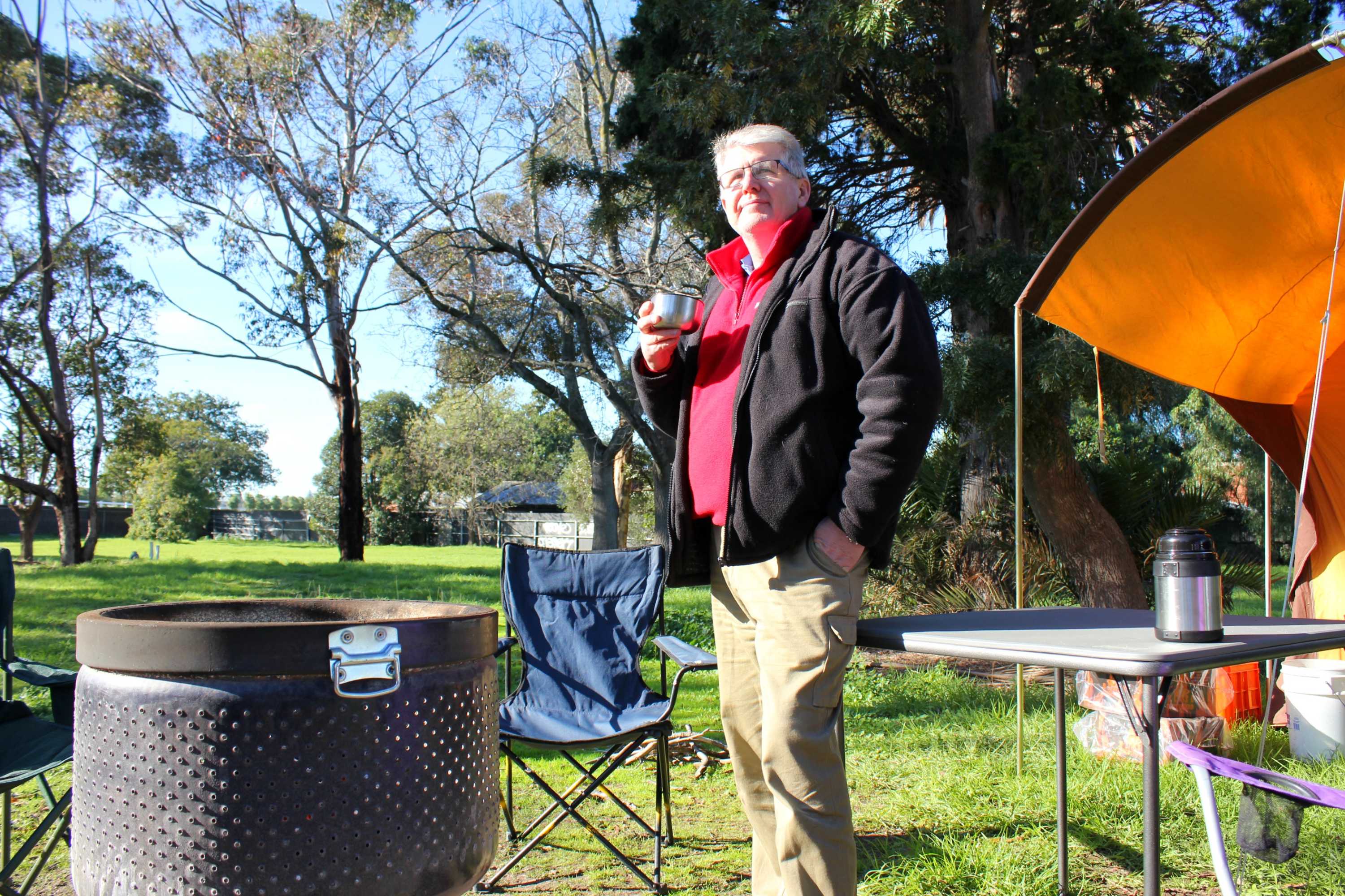 Cr Jim Magee is camping beside the Caulfield Racecourse to call for the site to be shared with other sporting clubs.