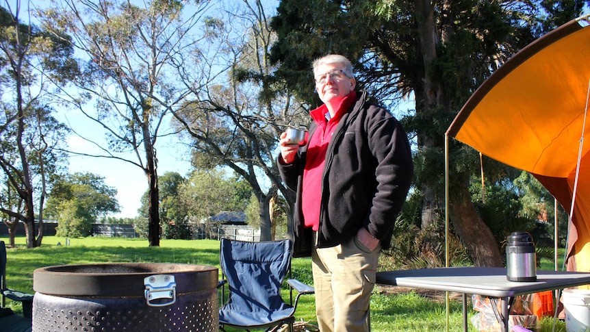 Cr Jim Magee is camping beside the Caulfield Racecourse to call for the site to be shared with other sporting clubs.