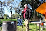 Cr Jim Magee is camping beside the Caulfield Racecourse to call for the site to be shared with other sporting clubs.