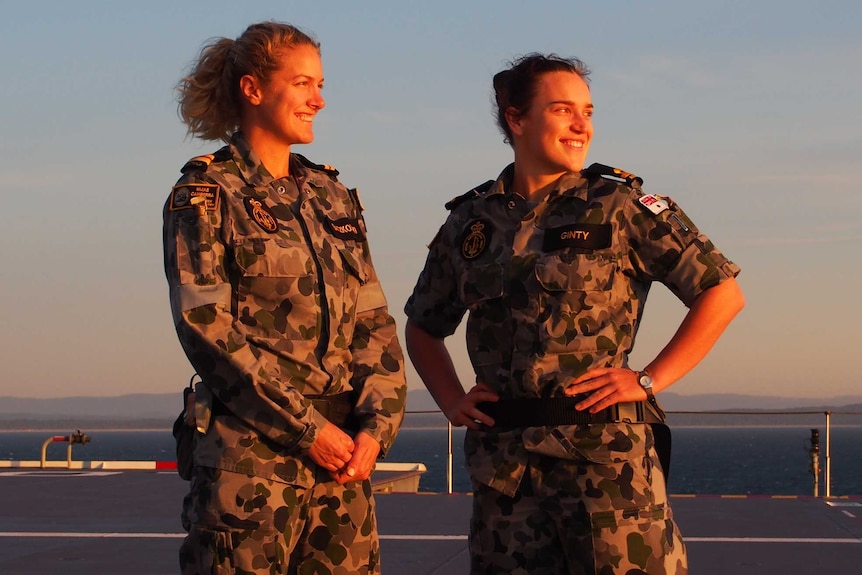 Lieutenant Anthea Baczkowski, dental officer (left) with Sub Lieutenant Catherine Ginty (right) on board HMAS Canberra.