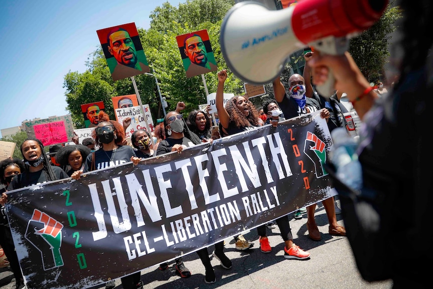 Demonstrators protest during a Juneteenth rally at the Brooklyn Museum last year.