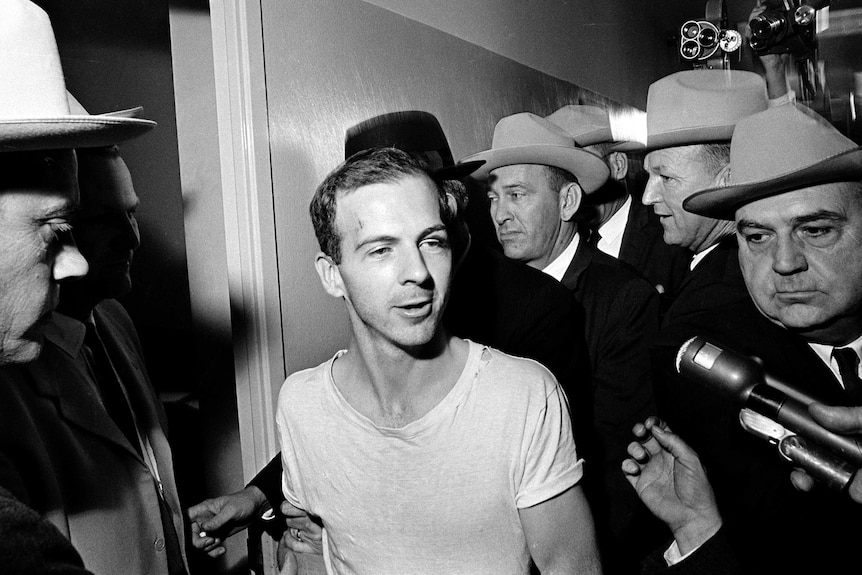 Lee Harvey Oswald talks to the media.