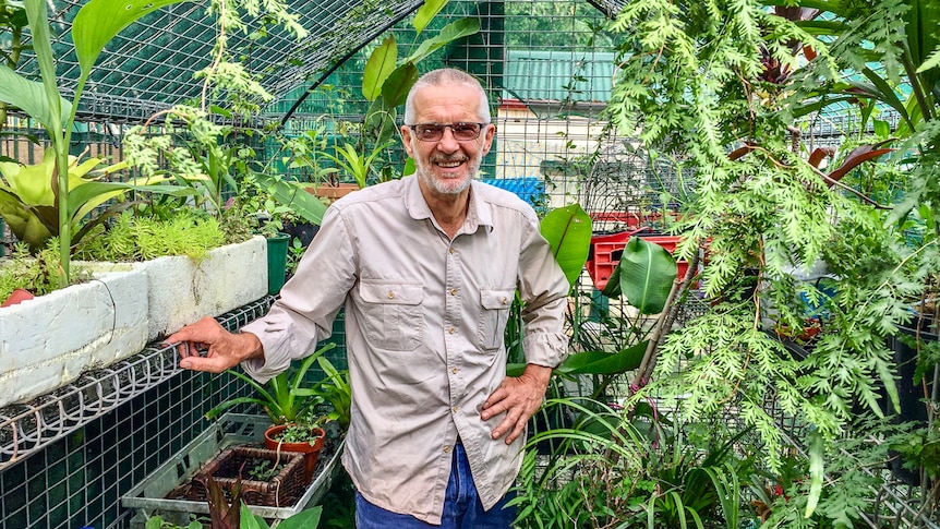 Groundsman Michael Scheer in a greenhouse in Brisbane.