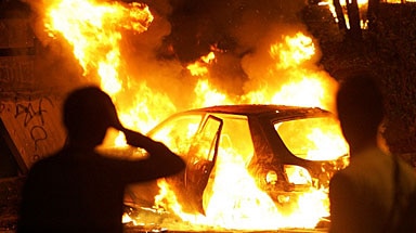 Rioting: Nearly 900 vehicles were set on fire and more than 250 people arrested.