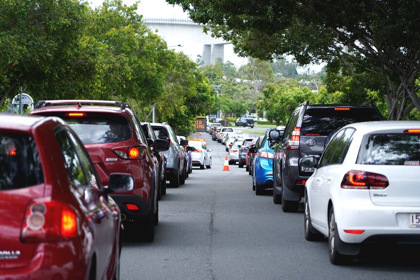 Cars queued at a drive-through COVID testing centre in Brisbane 