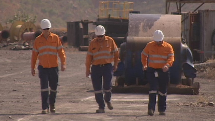 Workers walking on site