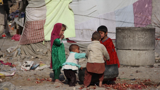 Children play in a compound shared by 21 families in Jalalabad, Afghanistan.