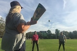 Mary Waters plays cricket with ANU teammates