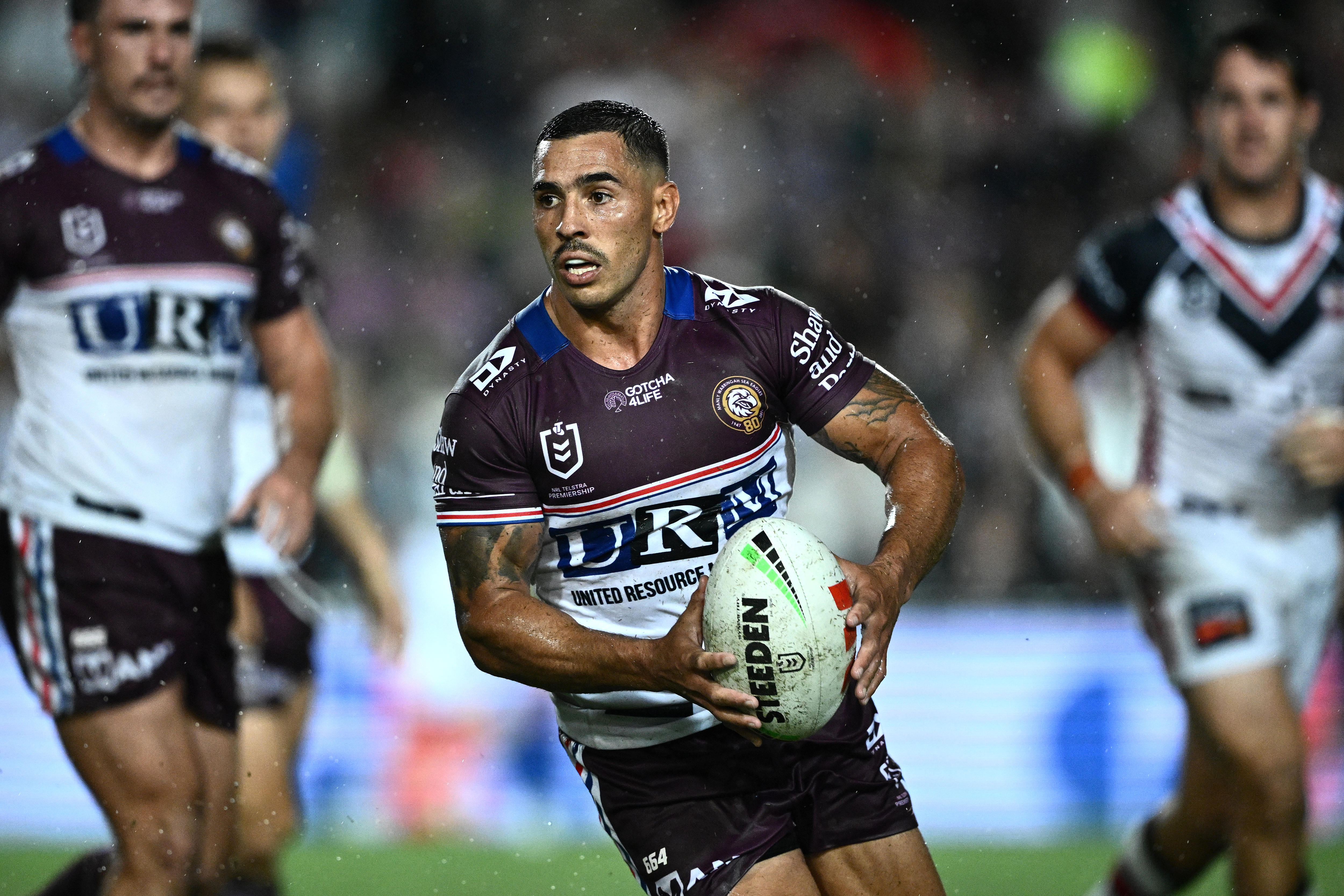 Jamal Fogarty carries the ball