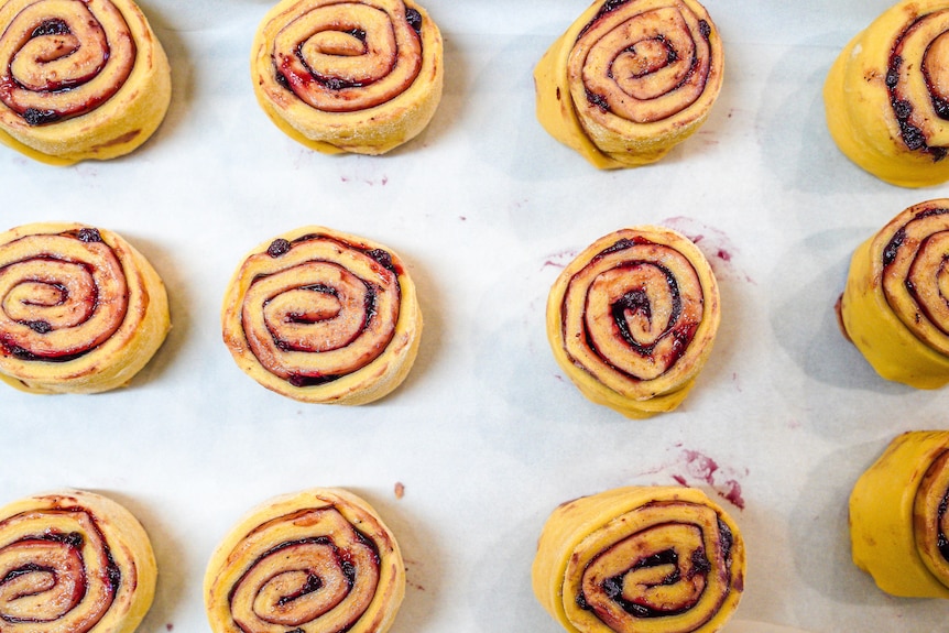 Scrolls on a tray ready to be put in the oven