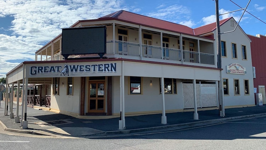An exterior image of the Great Western Hotel, which is a two storey building with a rodeo ground out the back