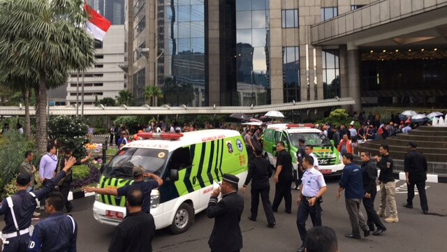 Ambulances are seen following reports of a collapsed structure inside the Indonesian Stock Exchange building in Jakarta