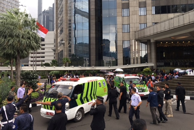 Ambulances are seen following reports of a collapsed structure inside the Indonesian Stock Exchange building in Jakarta