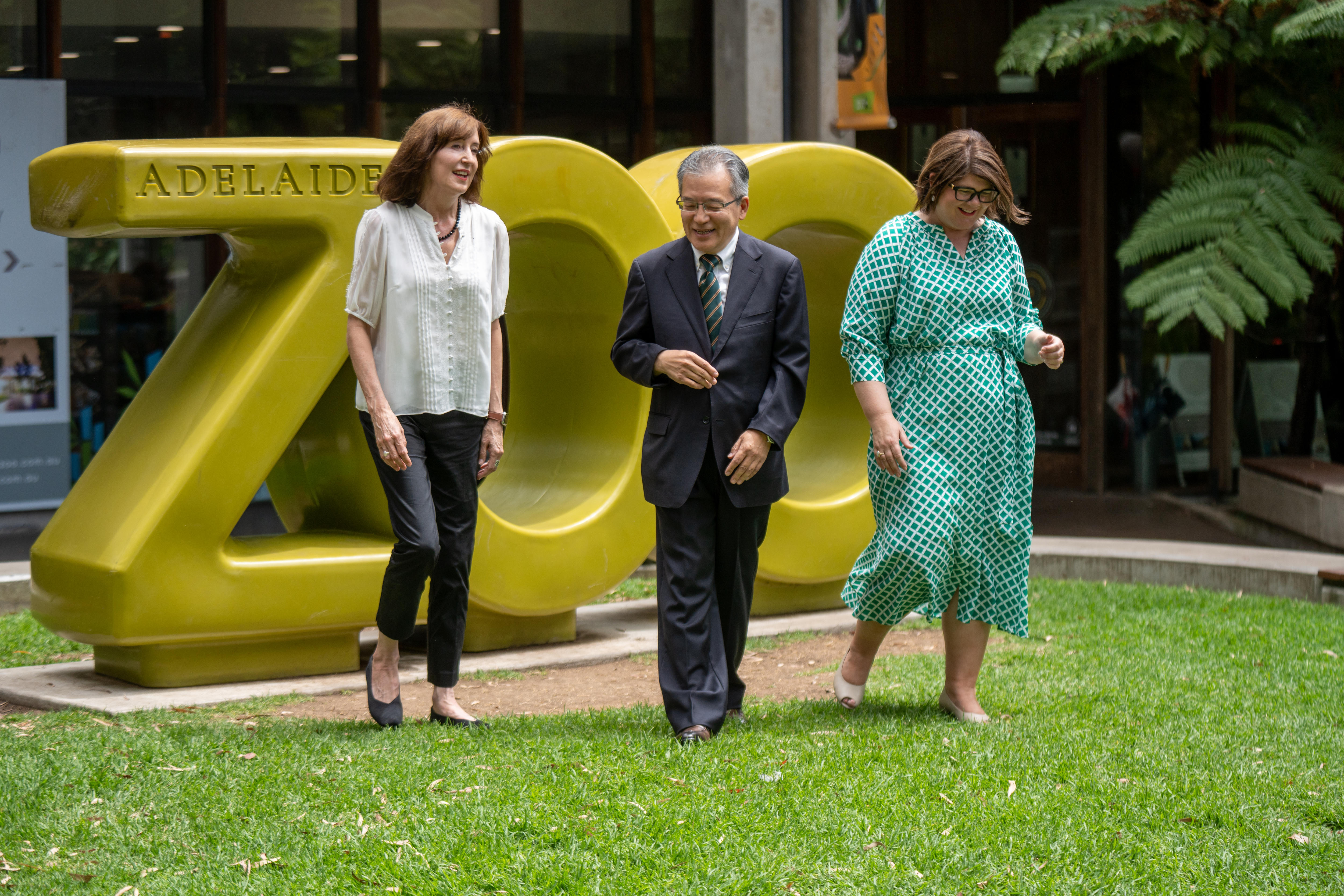 Susan Close, Li Dong and Zoe Bettison at a media conference.