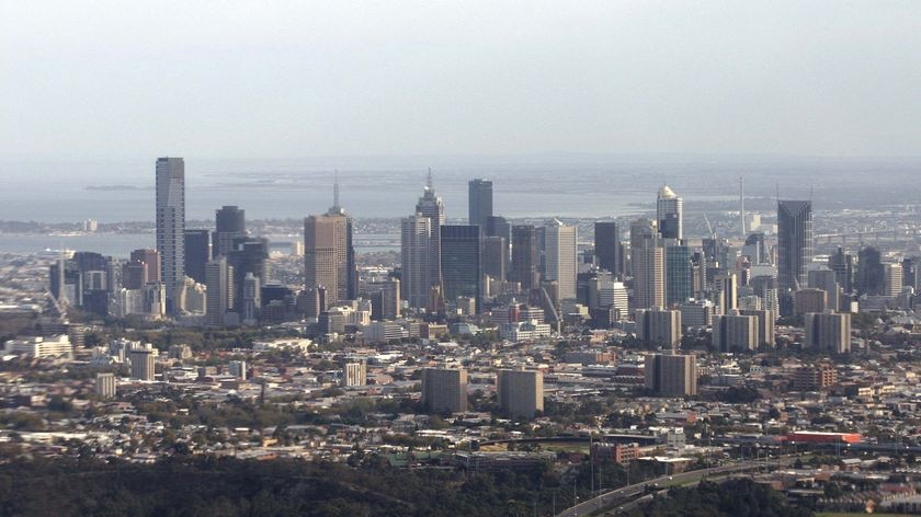 Boomtown: Melbourne's CBD with Port Phillip Bay beyond