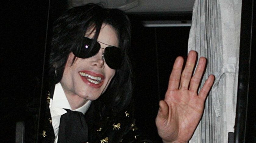 Michael Jackson waves to fans