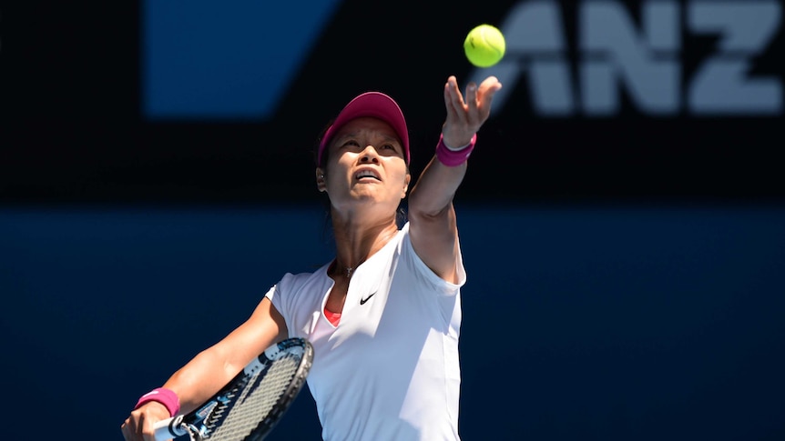 Eyes on the prize ... Li Na serves against Eugenie Bouchard