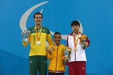 Australia's Blake Cochrane holds his silver medal after the men's 100m breaststroke SB7 final at the Rio Paralympics