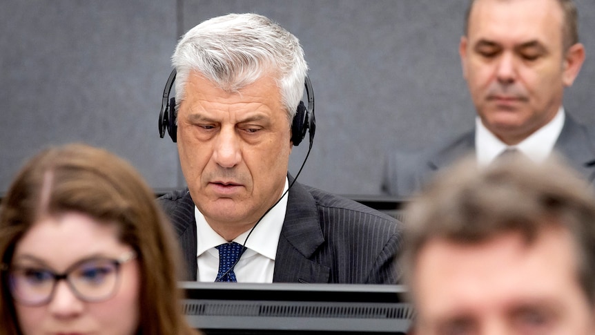 Former Kosovo President Hashim Thaci attends his war crimes trial in The Hague.
