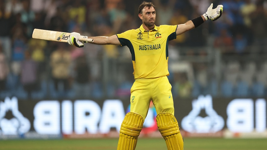 Glenn Maxwell celebrates hitting the winning runs for Australia against Afghanistan at the Cricket World Cup.