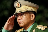 Myanmar Commander in Chief Senior General Min Aung Hlaing salutes.