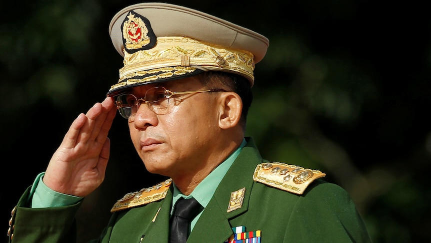 Myanmar Commander in Chief Senior General Min Aung Hlaing salutes.