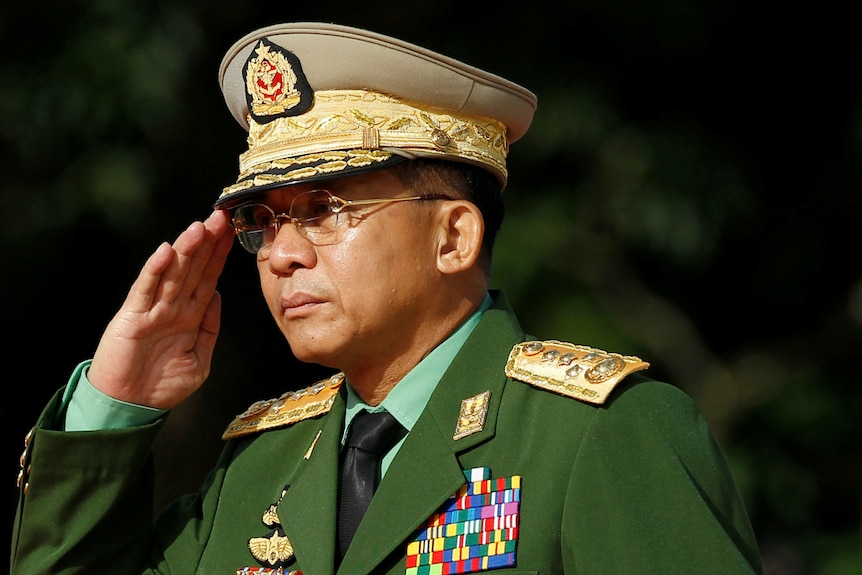 Myanmar Commander in Chief Senior General Min Aung Hlaing salutes.