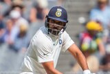 Rohit Sharma palys a cut shot at the MCG against Australia