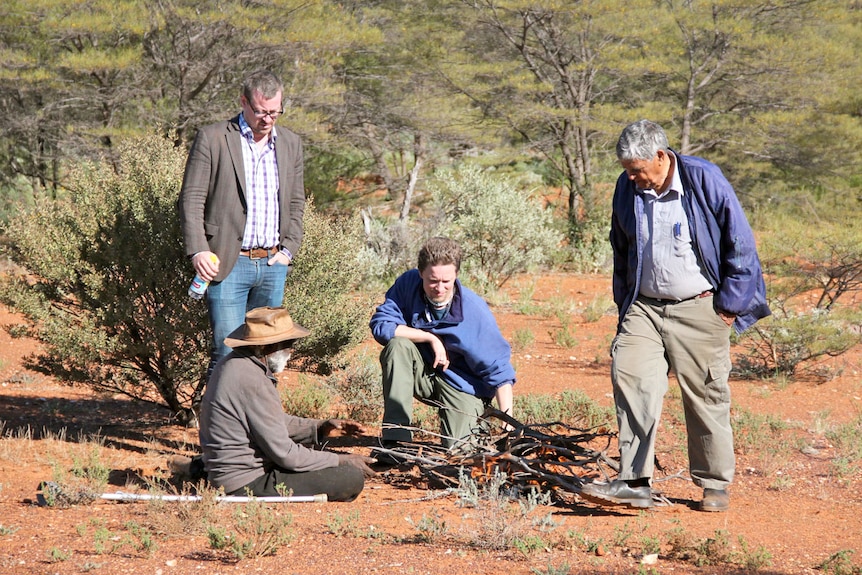 Researchers and Aboriginal elder