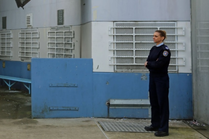 Guard standing outside prison
