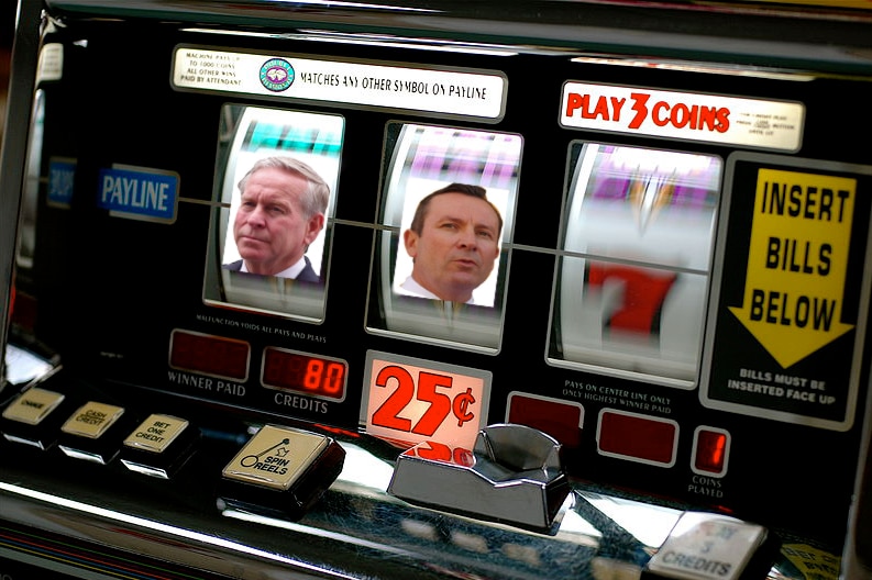 A slot machine with the faces of Mark McGowan and Colin Barnett.