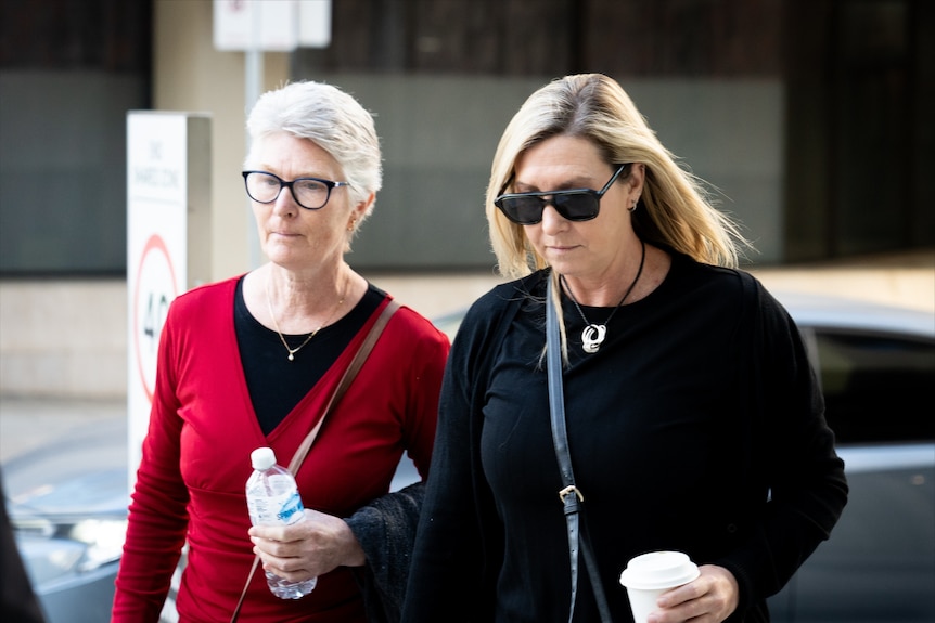 Christina Mitchell (left) arrives at the court to give evidence at the inquest.