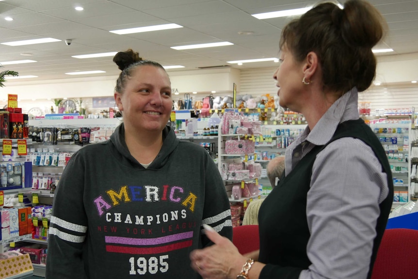 George Town resident Sarah Napier talking to her pharmacist about quitting smoking.