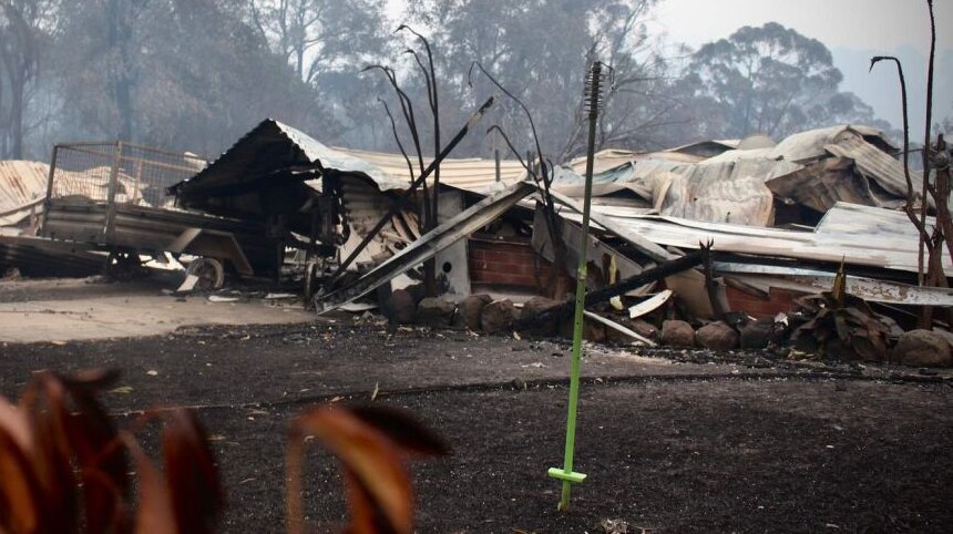 A home destroyed by a bushfire in Conjola Park on New Year's Eve last year.