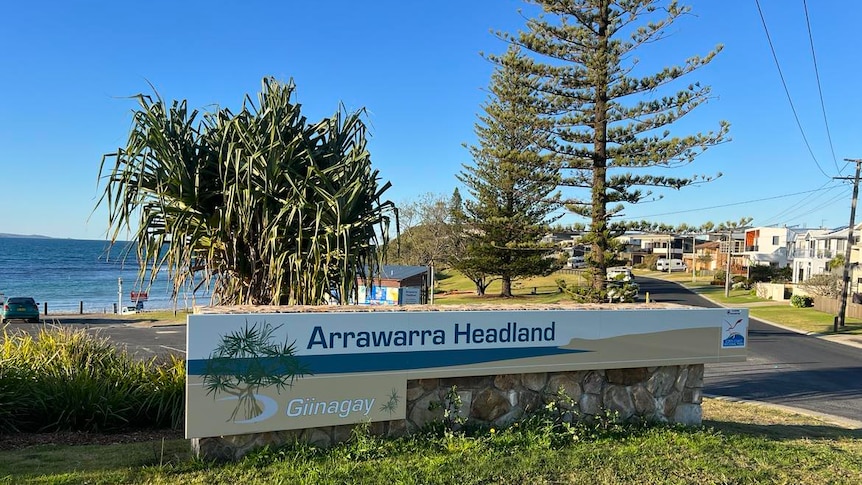 A picture of the sign welcoming locals to Arrawarra Headland
