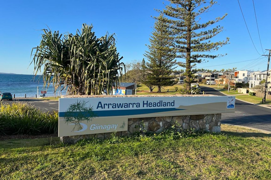 A picture of the sign welcoming locals to Arrawarra Headland