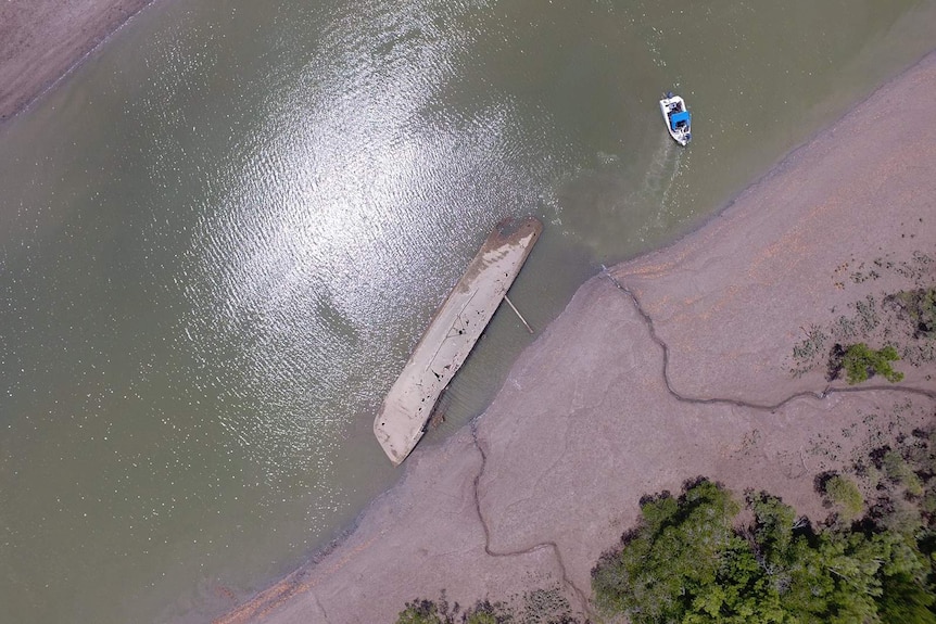 An aerial shot of a horizontal trawler in poor shape.
