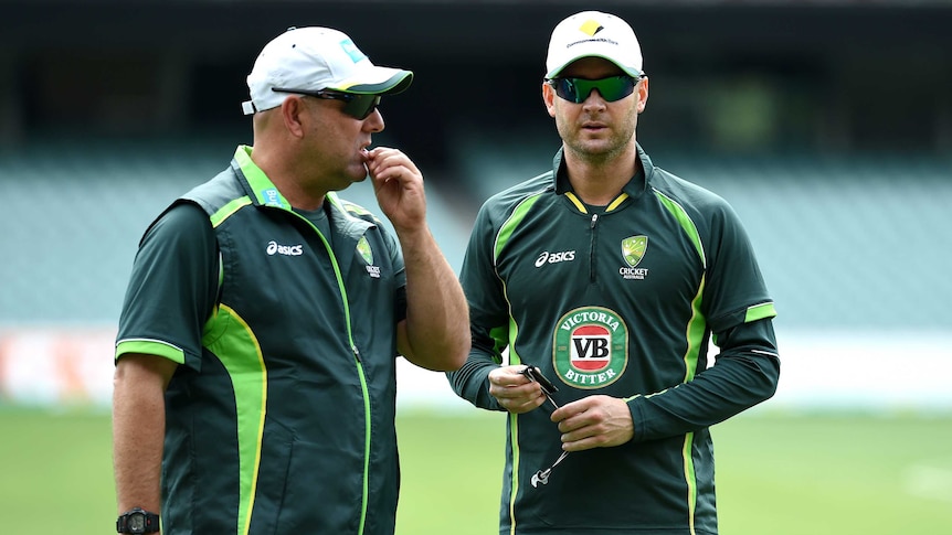Australian cricket coach Darren Lehmann (L) and captain Michael Clarke at training in December 2014.