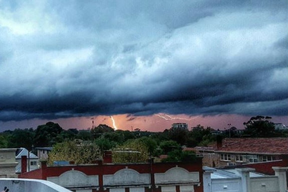 Storm clouds and lighting over inner-city Melbourne