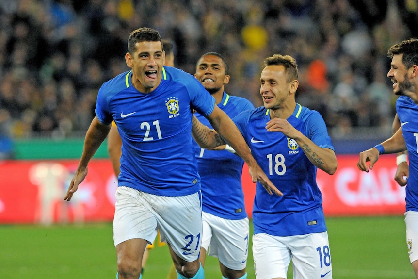 Diego Souza celebrates goal for Brazil against Australia