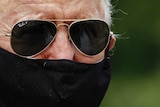 Democratic presidential candidate Joe Biden wears a face mask.