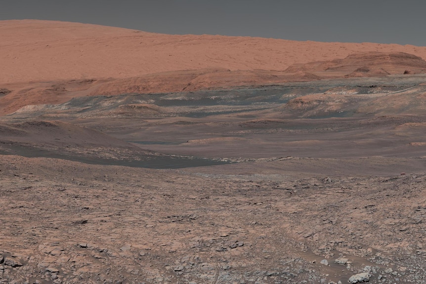 a mosiac of images taken by the Curiority Rover of the landscape around Mount Sharp 