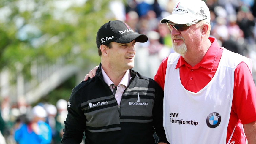 Zach Johnson walks off the last with caddie Damon Green in the final round of the PGA Tour playoff.