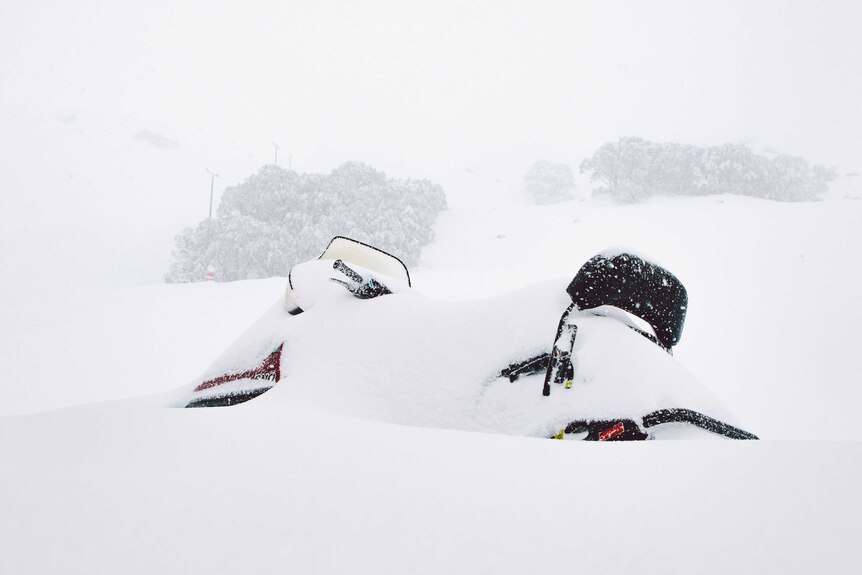 A motorbike covered in snow at Falls Creek.