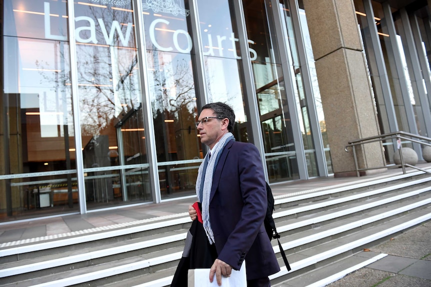 Human rights lawyer George Newhouse leaves the High Court in Sydney