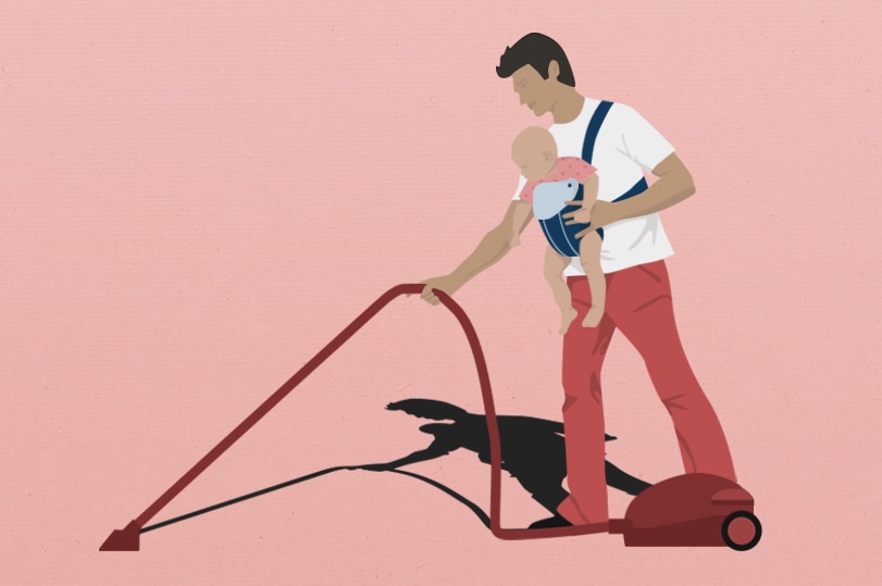 An illustration of a dad vacuuming with a baby strapped to him