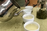 Tea being poured.