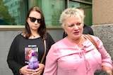 Sandra Welsh outside the inquest with family.