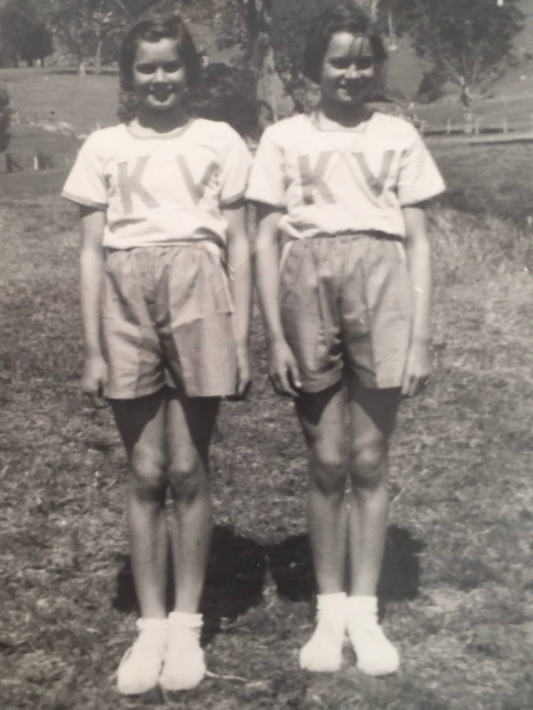 Black and white image of twin sisters